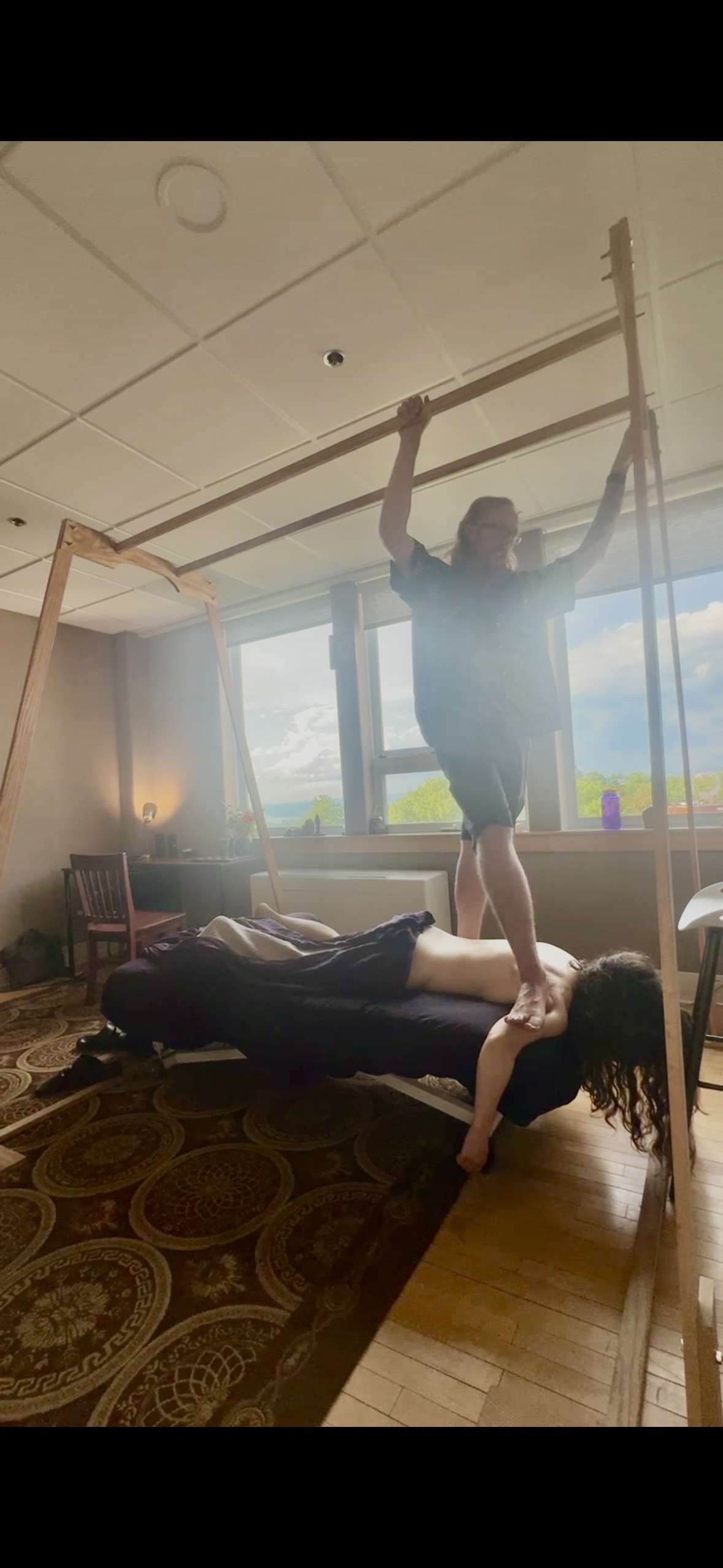 Brian Grafstein LMT Providing an Ashiatsu session